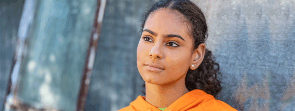 Young woman thinking about pregnancy test results