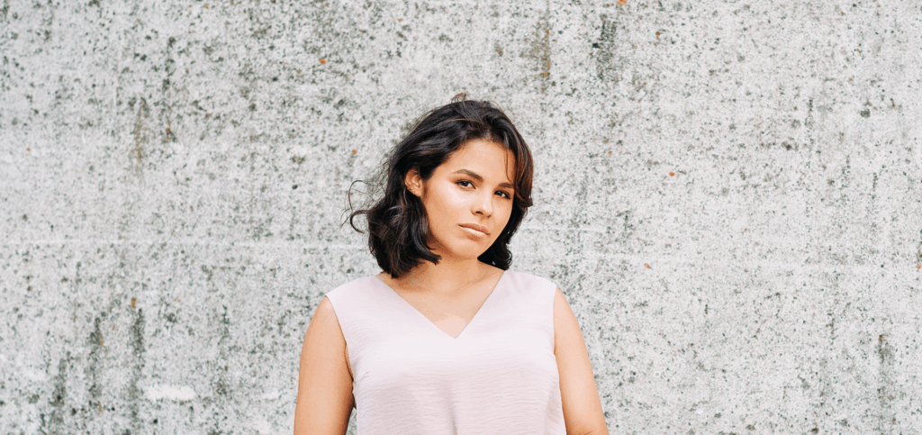 Someone thinking about how to tell her family she's pregnant